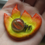 pyre-badge-in-palm.png